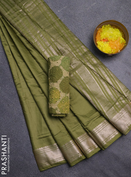 Semi chanderi saree mehendi green and beige with plain body and zari woven border