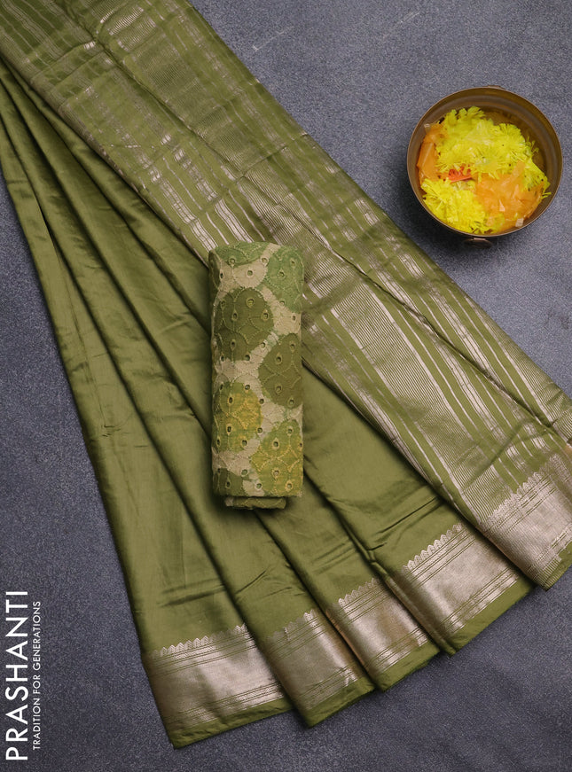 Semi chanderi saree mehendi green and beige with plain body and zari woven border