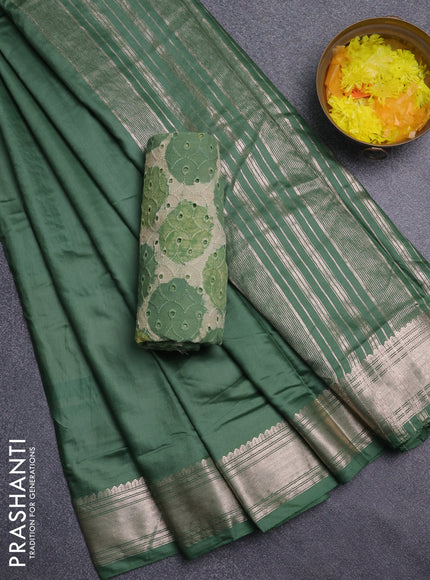 Semi chanderi saree green and beige with plain body and zari woven border