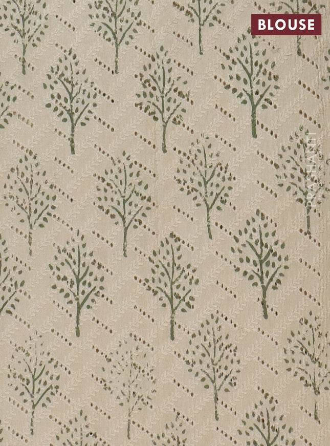 Semi chanderi saree light green and beige with plain body and zari woven border
