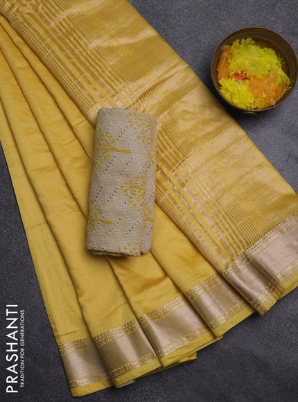 Semi chanderi saree yellow and beige with plain body and zari woven border