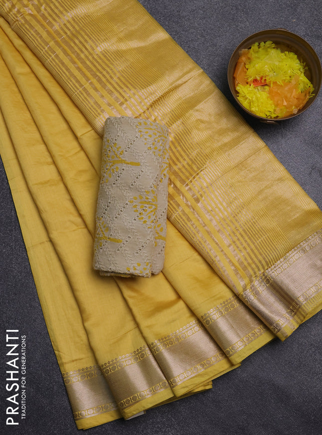 Semi chanderi saree yellow and beige with plain body and zari woven border