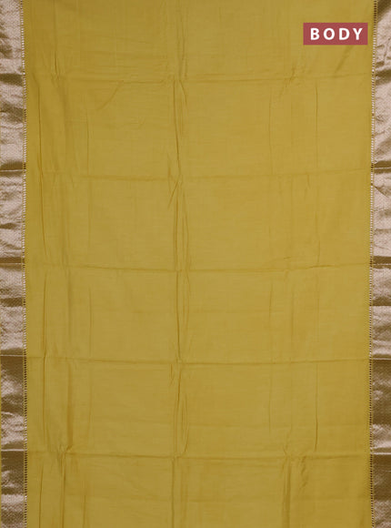 Semi chanderi saree yellow and beige with plain body and zari woven border