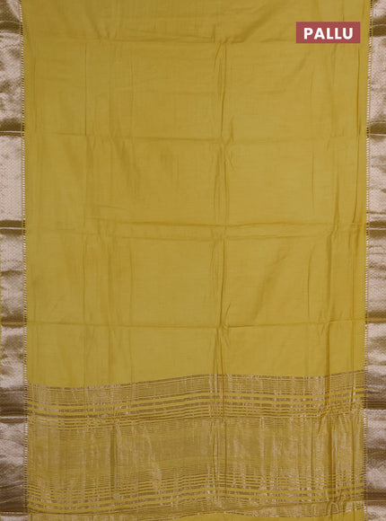 Semi chanderi saree yellow and beige with plain body and zari woven border