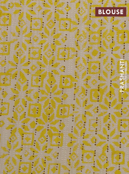 Semi chanderi saree yellow and beige with plain body and zari woven border