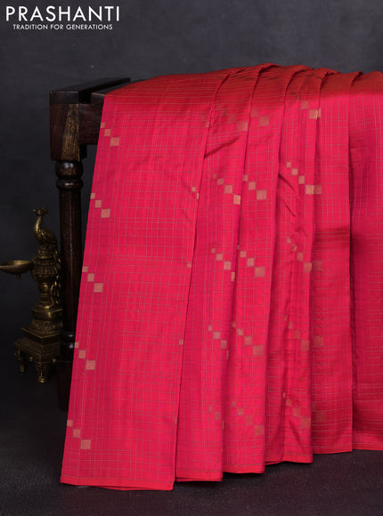 Kanchipuram silk saree dual shade of pinkish orange and mustard yellow with allover zari checks & buttas in borderless style