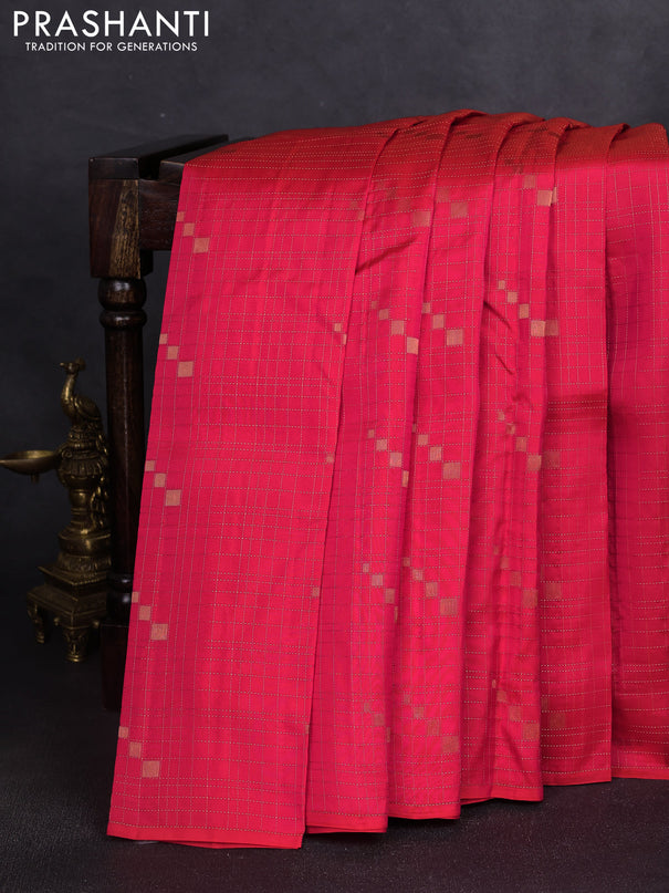 Kanchipuram silk saree dual shade of pinkish orange and mustard yellow with allover zari checks & buttas in borderless style