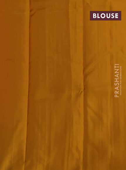Kanchipuram silk saree dual shade of pinkish orange and mustard yellow with allover zari checks & buttas in borderless style