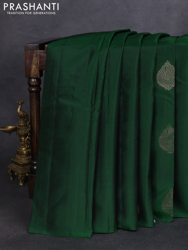 Kanchipuram silk saree bottle green and pink with zari woven buttas in borderless style