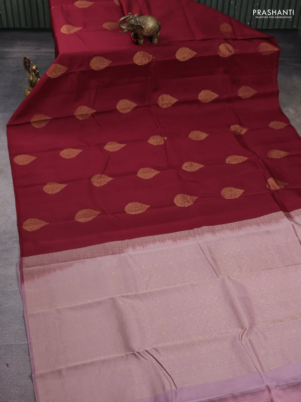 Kanchipuram silk saree maroon and pastel pink with zari woven buttas in borderless style