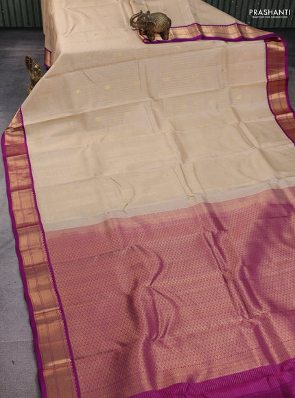 Kanchipuram silk saree cream and purple with allover small zari checks & buttas and rich zari woven korvai border
