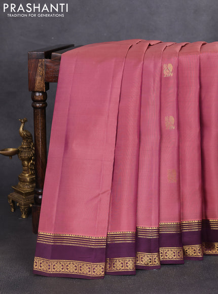 Kanchipuram silk saree dual shade of dark peach and wine shade with zari woven buttas and rettapet zari woven border
