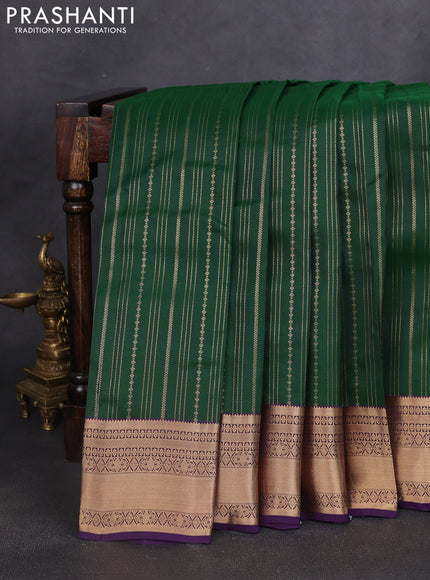 Kanchipuram silk saree dark green and violet with allover zari weaves and zari woven border