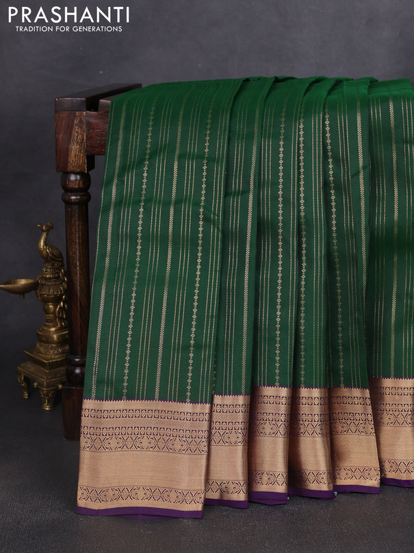 Kanchipuram silk saree dark green and violet with allover zari weaves and zari woven border