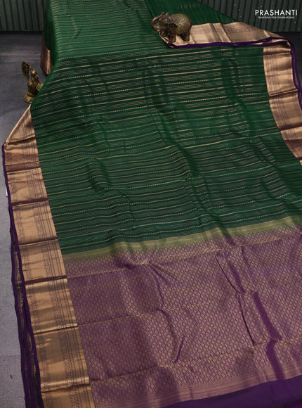 Kanchipuram silk saree dark green and violet with allover zari weaves and zari woven border