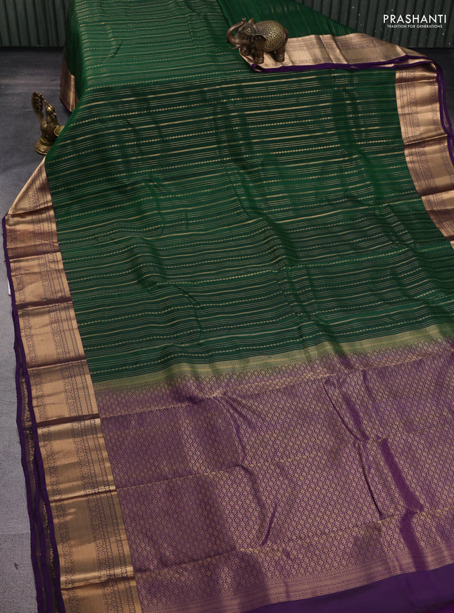 Kanchipuram silk saree dark green and violet with allover zari weaves and zari woven border