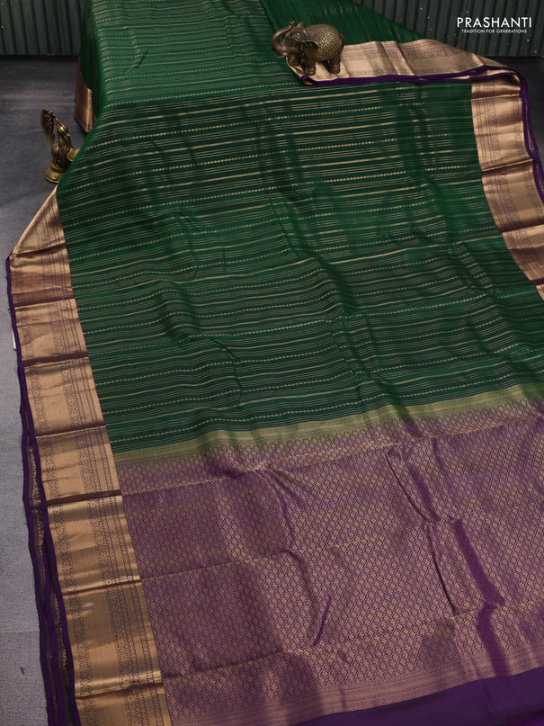 Kanchipuram silk saree dark green and violet with allover zari weaves and zari woven border