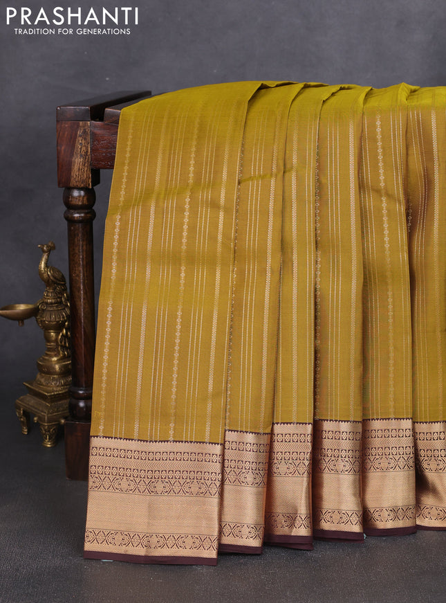 Kanchipuram silk saree mehendi green and brown with allover zari weaves and zari woven border