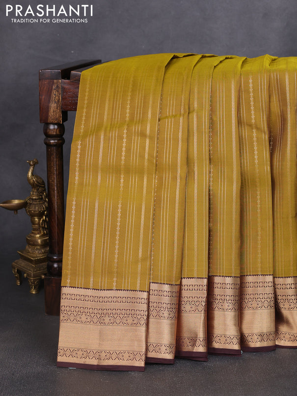 Kanchipuram silk saree mehendi green and brown with allover zari weaves and zari woven border