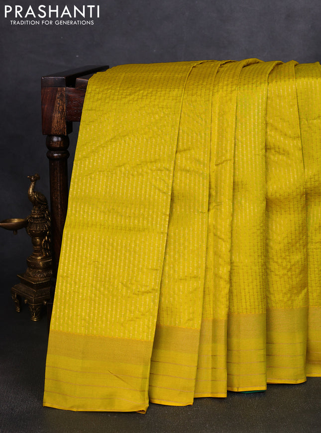 Kanchipuram silk saree lime yellow and teal green with allover zari weaves and rich zari woven border