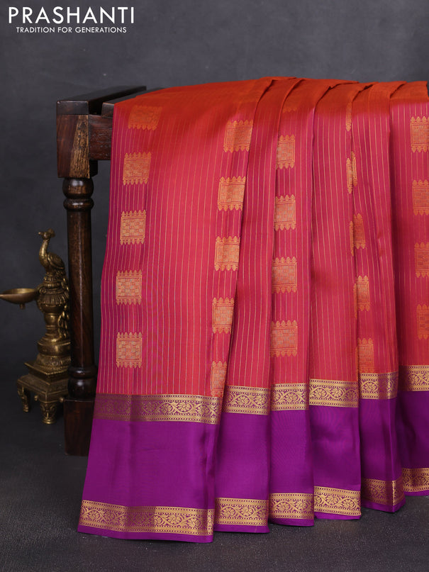Kanchipuram silk saree dual shade of pinkish orange and purple with allover zari weaves & buttas and rettapet zari woven border