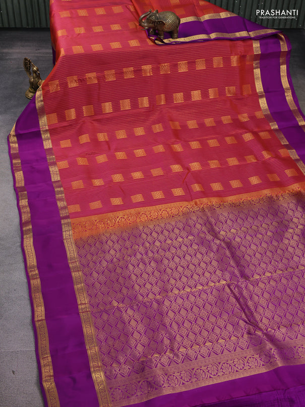 Kanchipuram silk saree dual shade of pinkish orange and purple with allover zari weaves & buttas and rettapet zari woven border