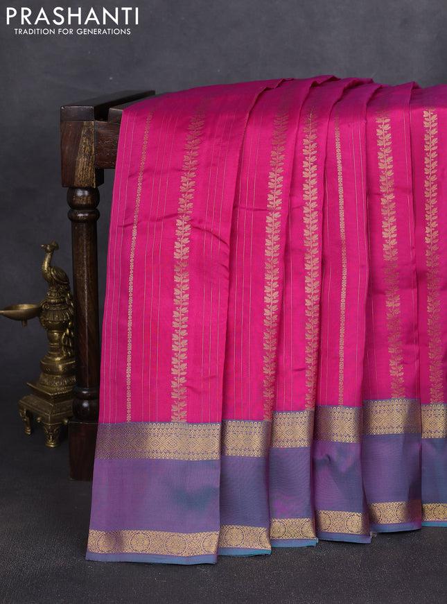 Kanchipuram silk saree pink and dual shade of teal blue with allover zari weaves and rettapet zari woven border
