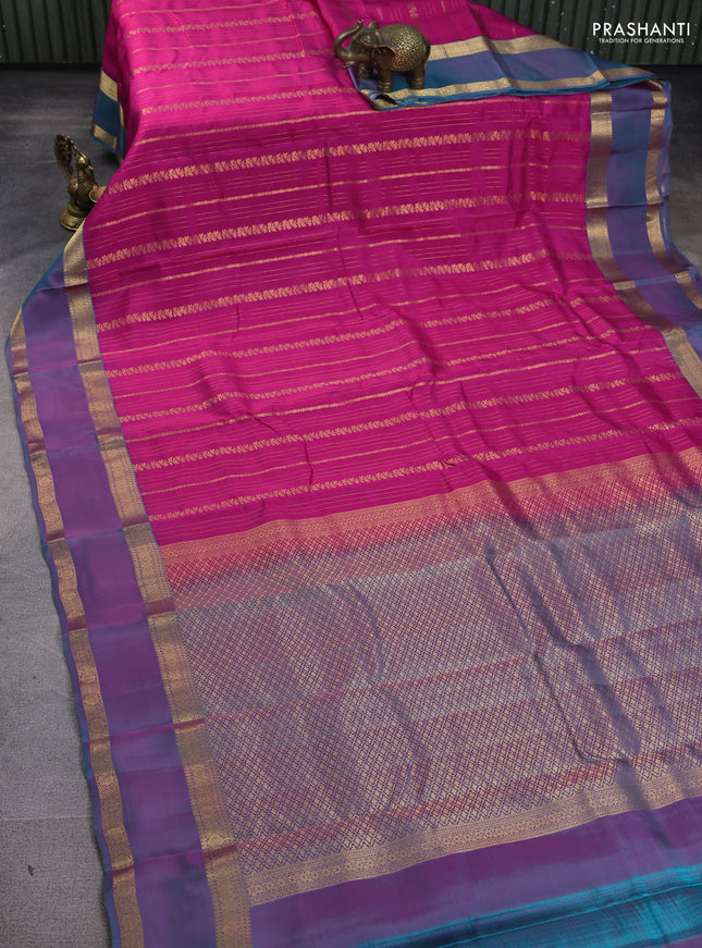 Kanchipuram silk saree pink and dual shade of teal blue with allover zari weaves and rettapet zari woven border
