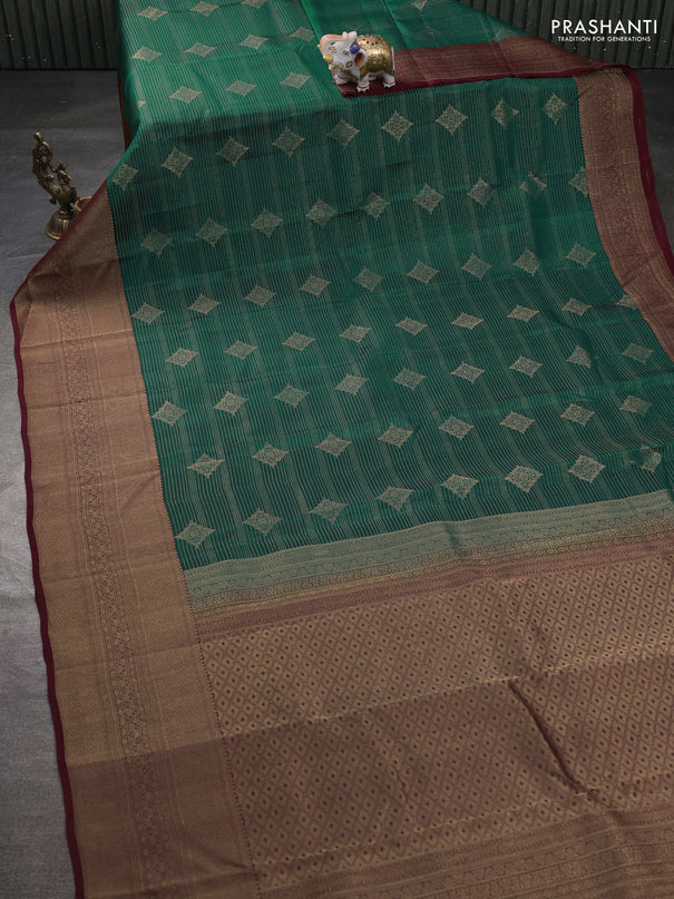 Kanchipuram silk saree teal green and maroon with allover zari weaves & buttas and long zari woven border