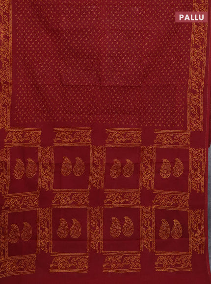 Sungudi cotton saree maroon with allover butta prints and printed border