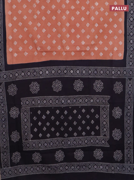 Sungudi cotton saree rust shade and navy blue with allover batik prints and printed border