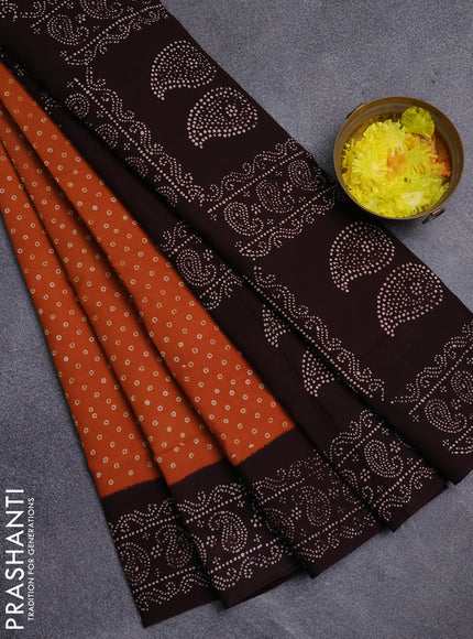 Sungudi cotton saree mustard yellow and coffee brown with allover batik prints and printed border