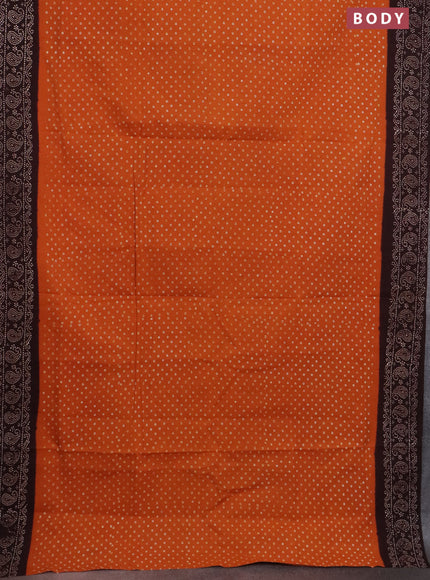 Sungudi cotton saree mustard yellow and coffee brown with allover batik prints and printed border