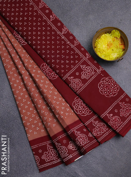 Sungudi cotton saree rust shade and maroon with allover butta prints and printed border