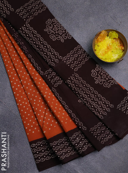 Sungudi cotton saree mustard yellow and coffee brown with allover batik prints and printed border