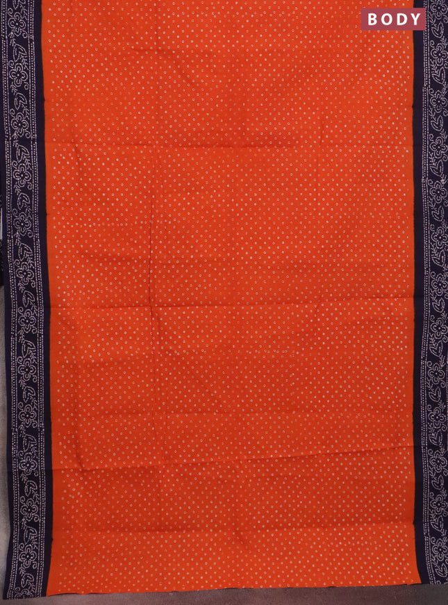 Sungudi cotton saree orange and navy blue with allover batik prints and printed border