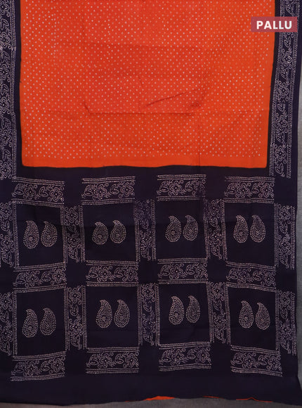 Sungudi cotton saree orange and navy blue with allover batik prints and printed border