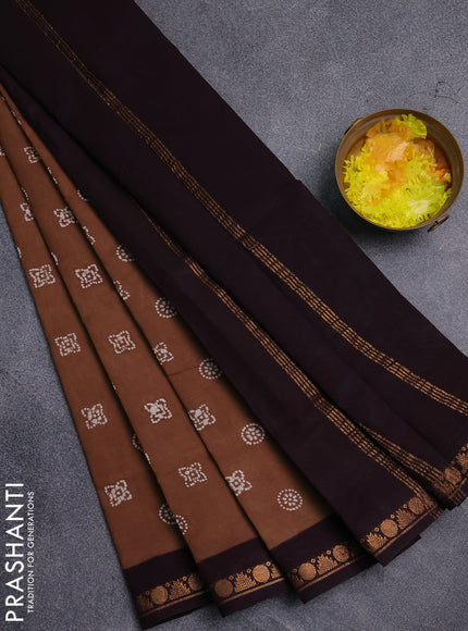 Sungudi cotton saree dark sandal and wine shade with allover batik prints and zari woven border