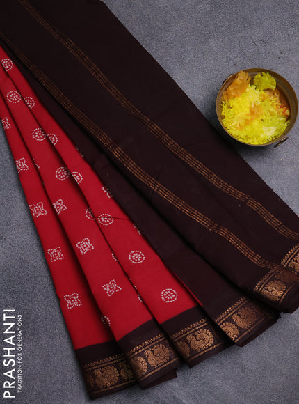 Sungudi cotton saree red and coffee brown with allover batik prints and zari woven border