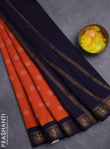 Sungudi cotton saree orange and navy blue with allover batik prints and zari woven border