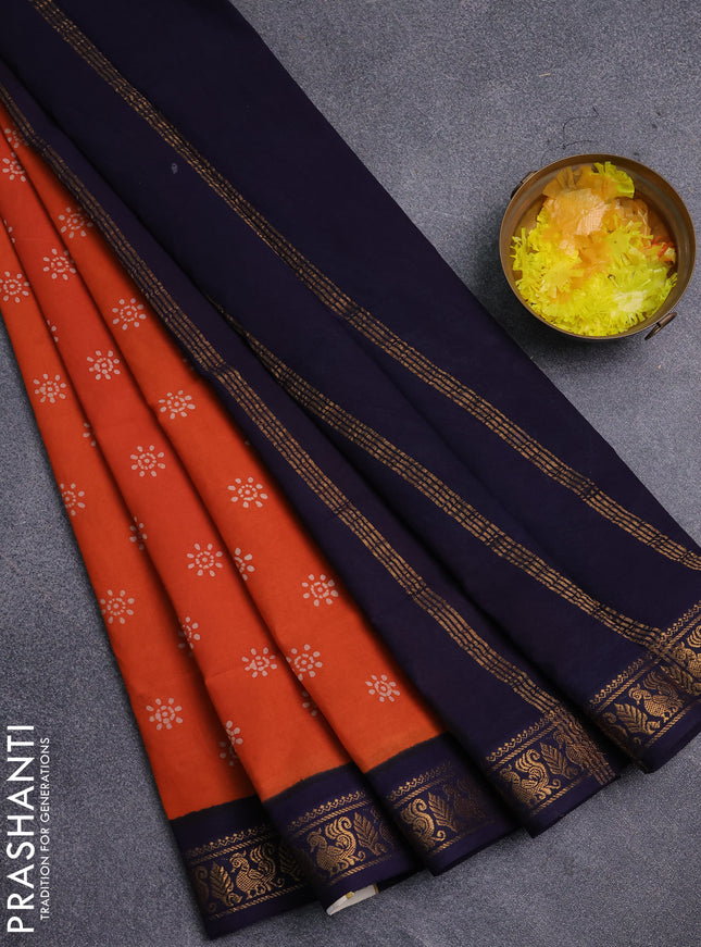 Sungudi cotton saree orange and navy blue with allover batik prints and zari woven border