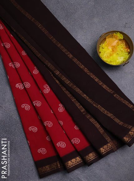Sungudi cotton saree red and coffee brown with allover batik prints and zari woven border