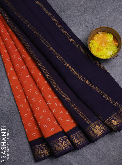 Sungudi cotton saree orange and navy blue with allover batik prints and zari woven border