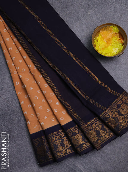 Sungudi cotton saree sandal and navy blue with allover batik prints and zari woven border