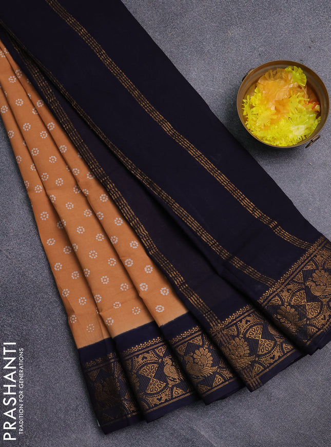 Sungudi cotton saree sandal and navy blue with allover batik prints and zari woven border