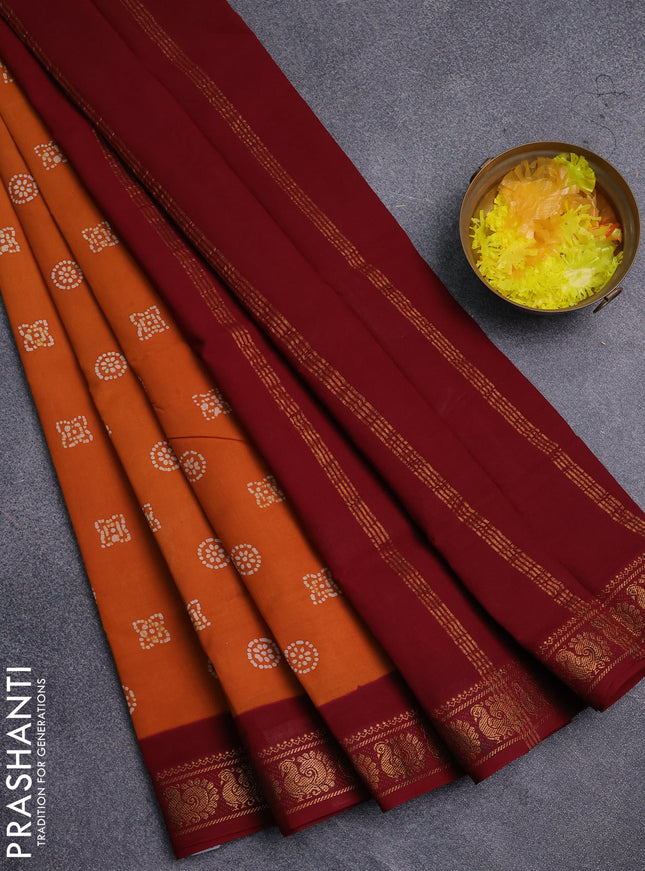 Sungudi cotton saree mustard yellow and maroon with allover batik prints and zari woven border