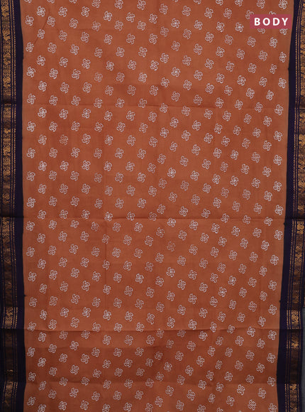 Sungudi cotton saree sandal and navy blue with allover batik prints and zari woven border