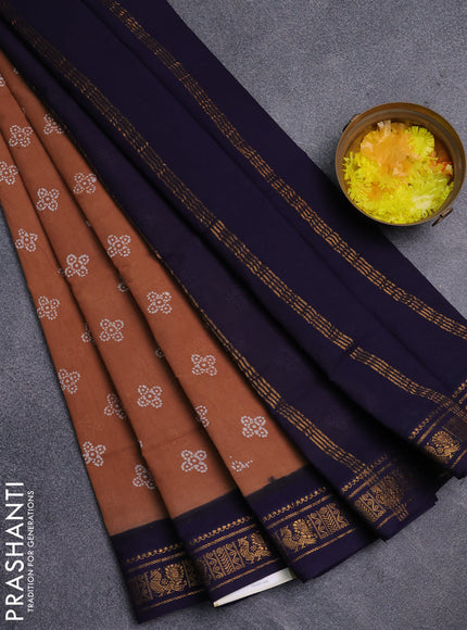 Sungudi cotton saree sandal and navy blue with allover batik prints and zari woven border