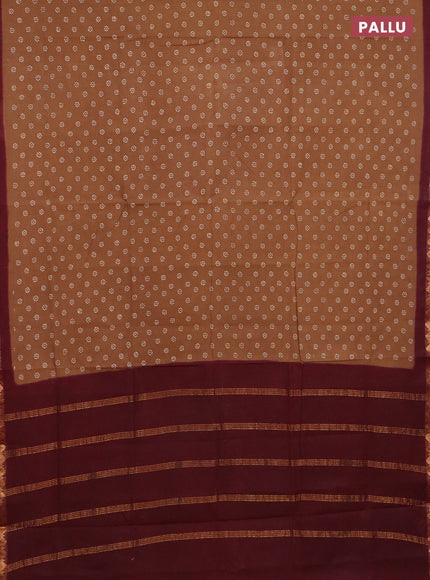 Sungudi cotton saree dark sandal and deep maroon with allover batik prints and zari woven border