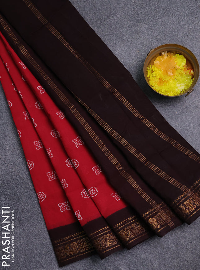 Sungudi cotton saree red and coffee brown with allover batik prints and zari woven border